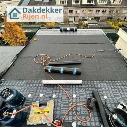 Plat dak Rijen opnieuw leggen
